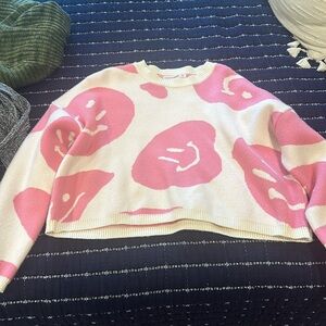 Pink smiley face sweater